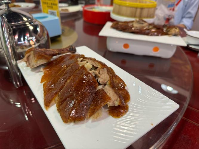 新澳2025今晚开奖结果和烤鸭为何20多元一只与烤鸭为何20多元一只呢